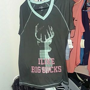 women t-shirt that says " i like big bucks"